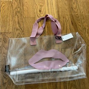 Saks Fifth Avenue pink lips clear plastic tote. New with tags.